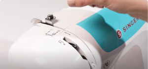 Thread a sewing machine