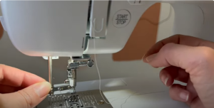 Using automatic needle threader